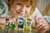 Конструктор LEGO® Friends Карусель із квітами й чашками та казкова фотобудка Іграшка, 321 деталь (42702)